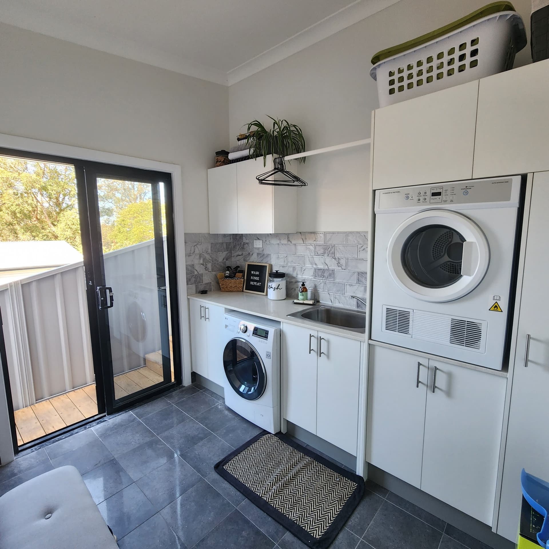 The new laundry opening to the deck