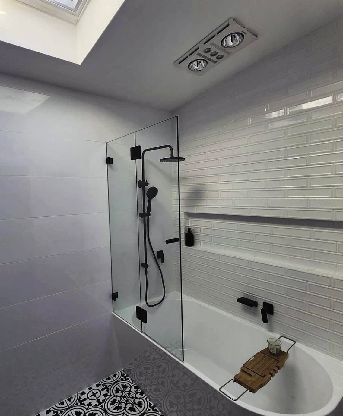 Shower over bath with matte black fittings
