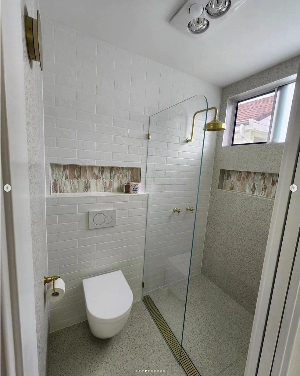 The new bathroom — walk-in shower and wall-hung vanity
