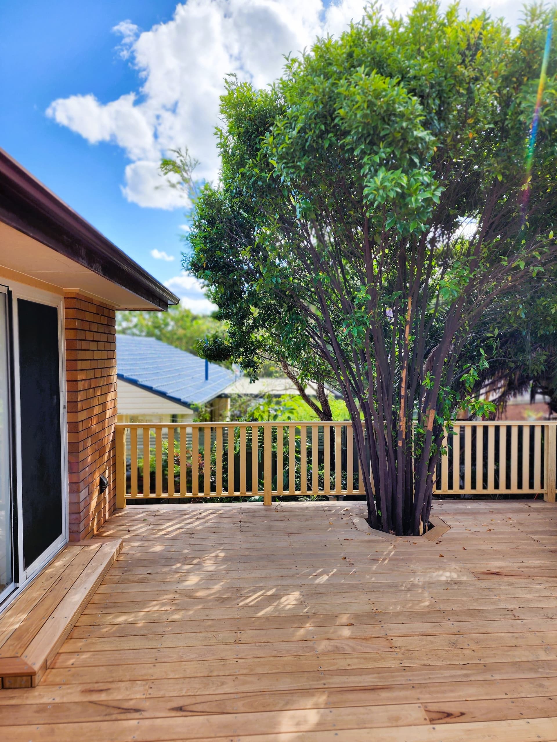Deck built around an existing tree