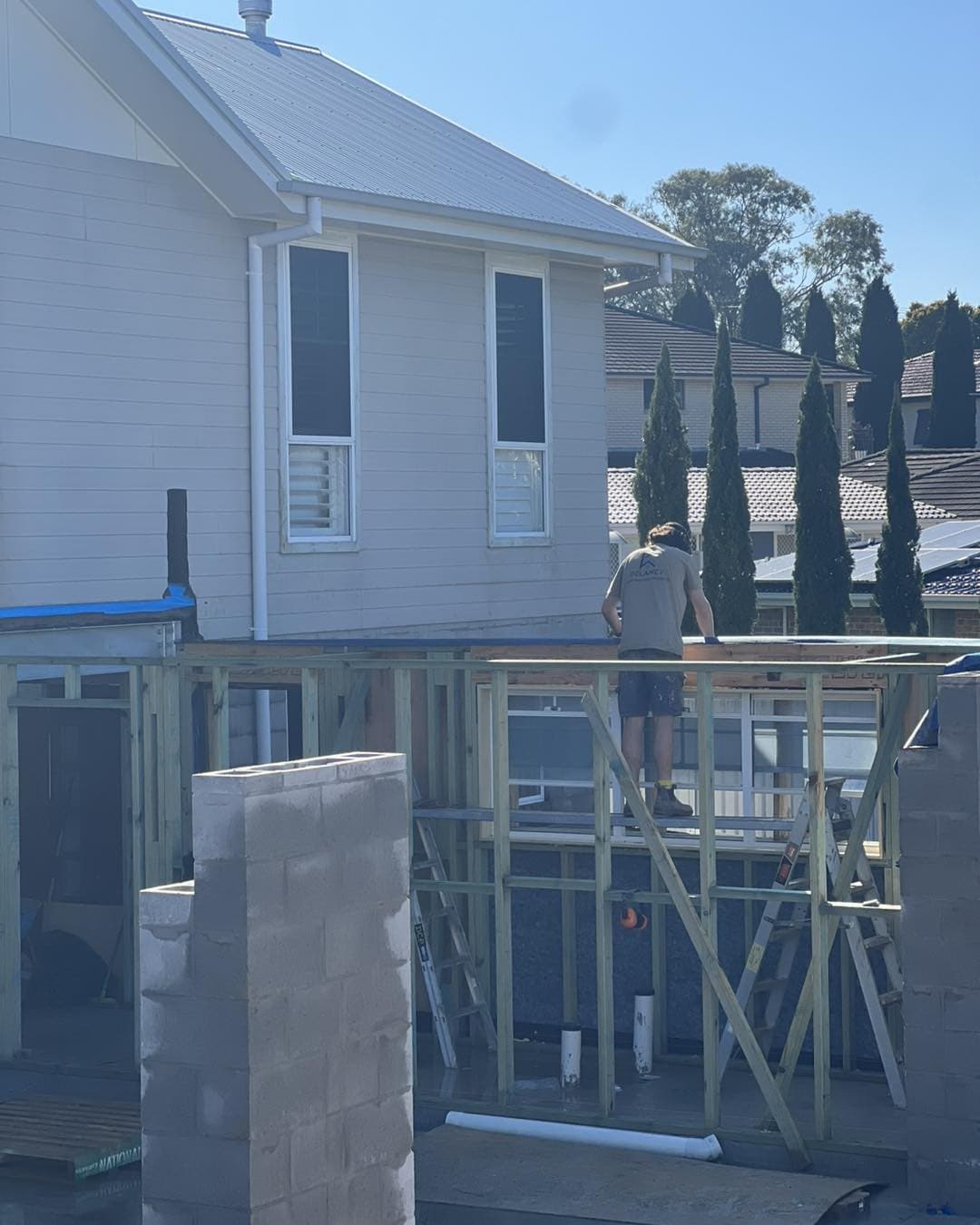 Framing stage — the two-storey structure standing