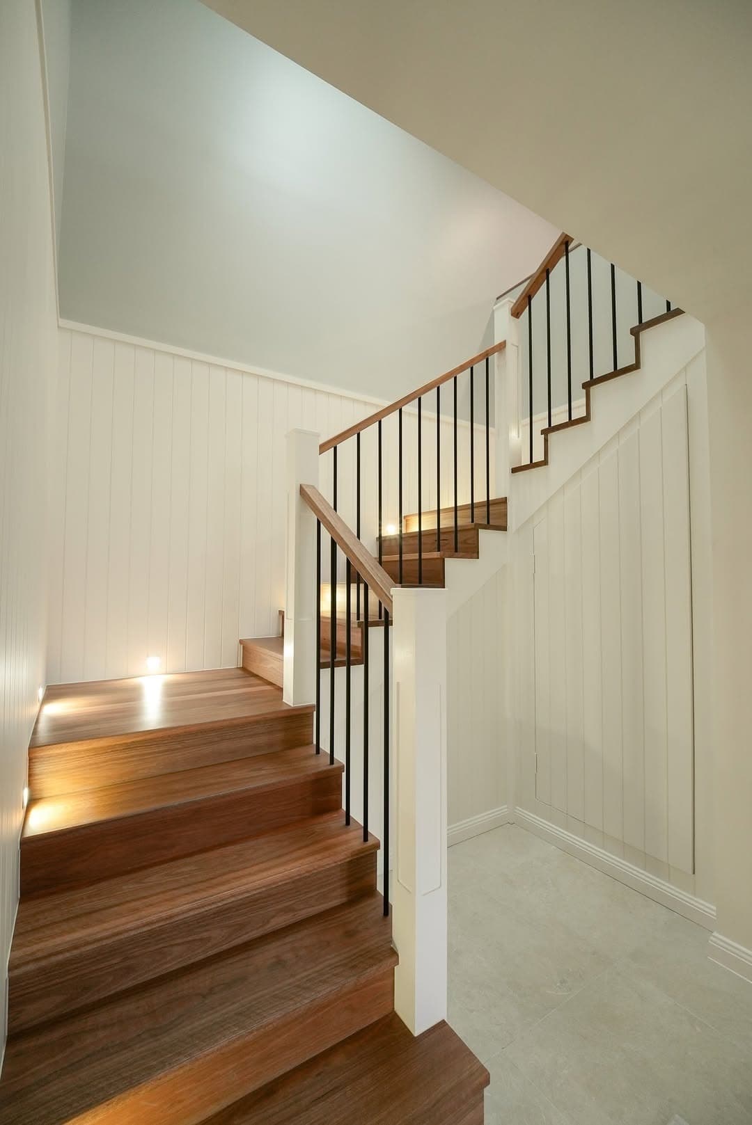 The new timber stair with white balustrade