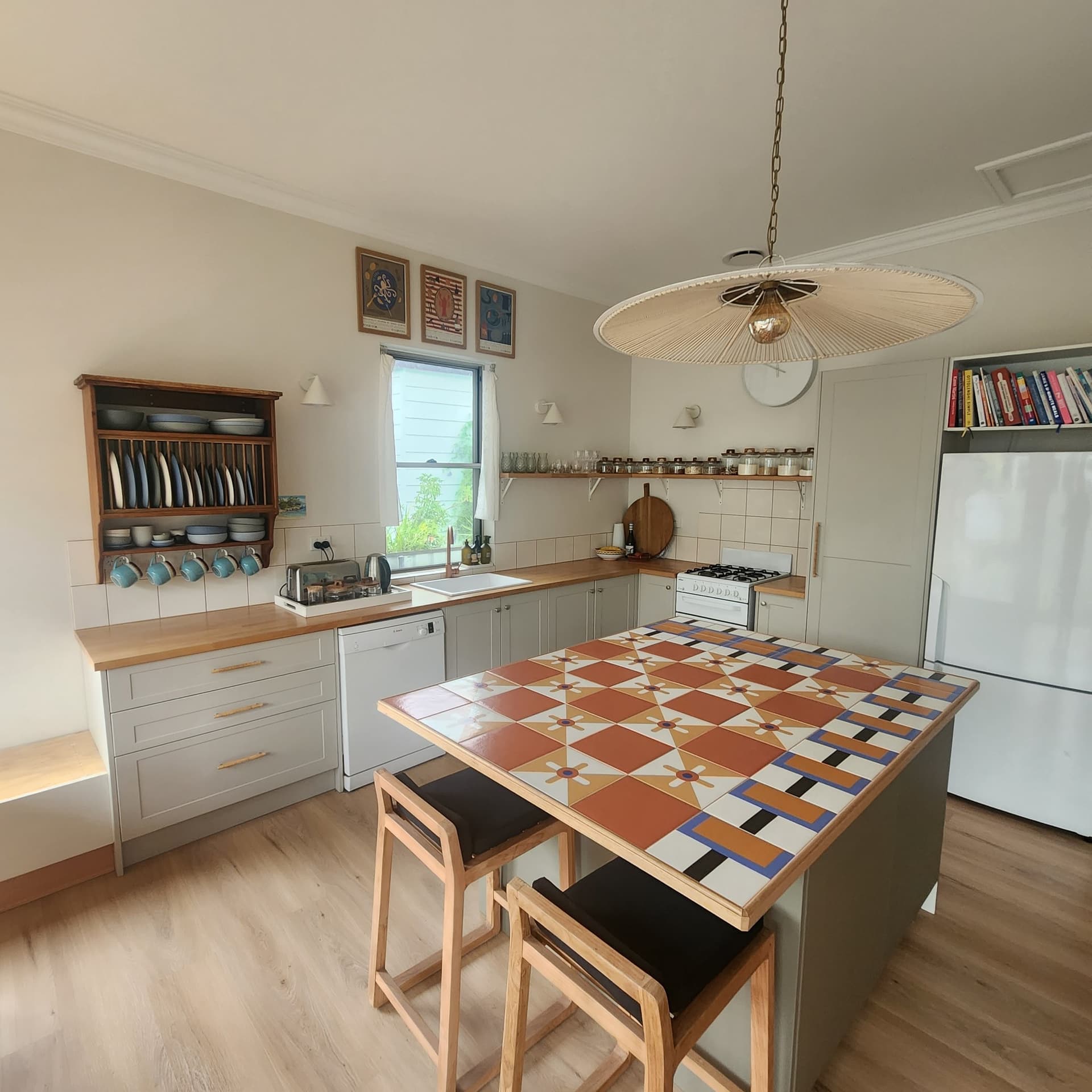 Country kitchen with a checkerboard-tiled island