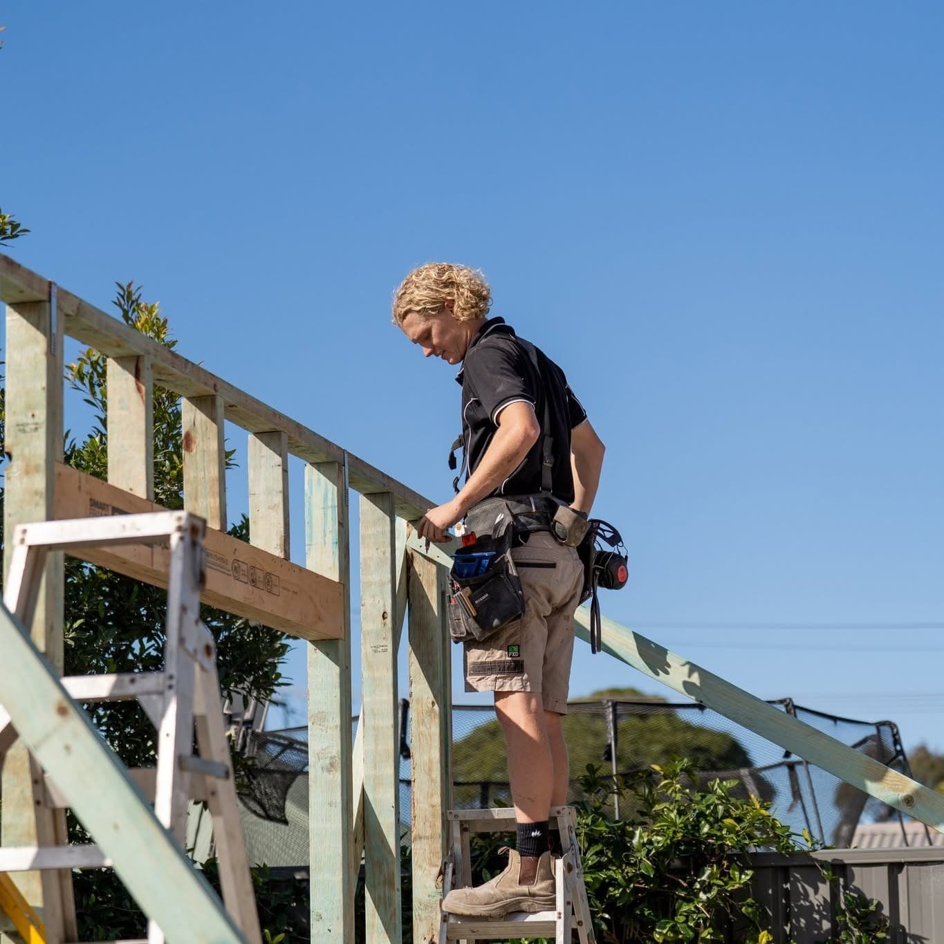 Standing wall frames on a Delaney Construction Projects extension